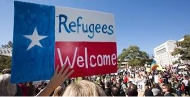 Banner at Protest displaying Refugees Welcome 
