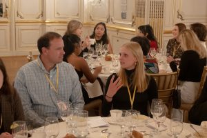 Audrey Thibert at the welcome dinner at the Cosmos Club speaking with Pulitzer Center Board Member Joseph Pulitzer V