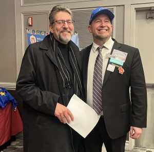 Csanád Siklós (left) with President-elect of NCSS, Joe Schmidt (right).